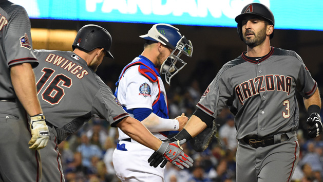 Apr 13, 2018; Los Angeles, CA, USA; Arizona Diamondbacks third baseman Daniel Descalso (3) is greeted at the plate by center fielder Chris Owings (16) after hitting a two run home run in the seventh inning of the game at Dodger Stadium. Photo Credit: Jayne Kamin-Oncea-USA TODAY Sports