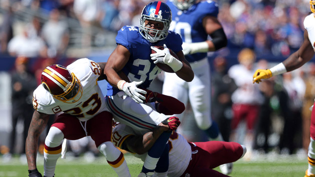 Sep 25, 2016; East Rutherford, NJ, USA; New York Giants running back Shane Vereen (34) carries the ball as Washington Redskins safety DeAngelo Hall (23) and safety David Bruton Jr. (30) defend during the first quarter at MetLife Stadium. Photo Credit: Brad Penner-USA TODAY Sports