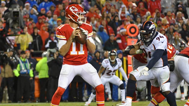 Dec 25, 2016; Kansas City, MO, USA; Kansas City Chiefs quarterback Alex Smith (11) looks to throw a pass as Denver Broncos outside linebacker DeMarcus Ware (94) defends during the first half at Arrowhead Stadium. Mandatory Credit: Denny Medley-USA TODAY Sports