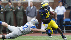 Robinson leads Michigan to win over Air Force