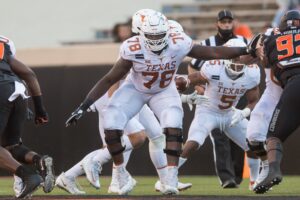 Texas OL Okafor to have season-ending surgery