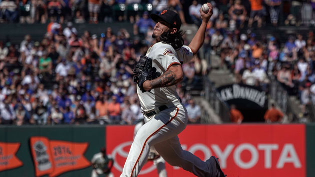 Jul 11, 2018; San Francisco, CA, USA; San Francisco Giants starting pitcher Dereck Rodriguez (57) pitches against the Chicago Cubs during the eleventh inning at AT&T Park. Photo Credit: Stan Szeto-USA TODAY Sports