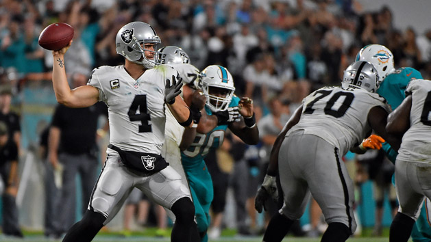 Nov 5, 2017; Miami Gardens, FL, USA; Oakland Raiders quarterback Derek Carr (4) attempts a pass against the Miami Dolphins during the second half at Hard Rock Stadium. Photo Credit: Jasen Vinlove-USA TODAY Sports