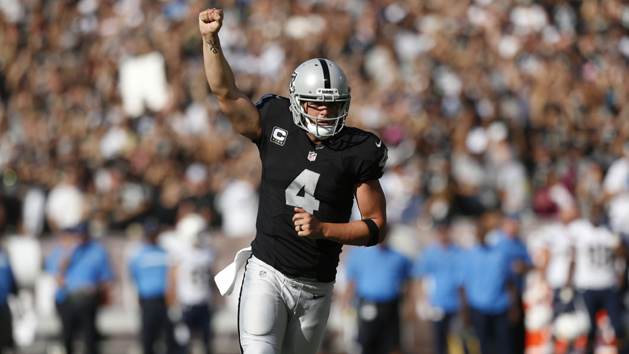 Oct 9, 2016; Oakland, CA, USA; Oakland Raiders quarterback Derek Carr (4) reacts after throwing a touchdown pass against the San Diego Chargers in the third quarter at Oakland Coliseum. The Raiders defeated the Chargers 34-31. Photo Credit: Cary Edmondson-USA TODAY Sports