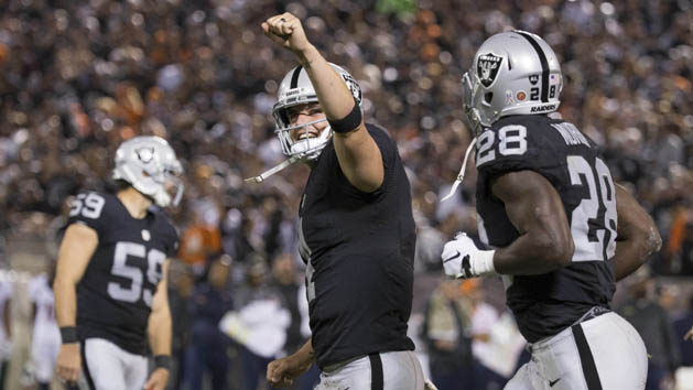 Nov 6, 2016; Oakland, CA, USA; Oakland Raiders quarterback Derek Carr (4) celebrates after a touchdown in the second quarter against the Denver Broncos at Oakland Coliseum. Photo Credit: Neville E. Guard-USA TODAY Sports
