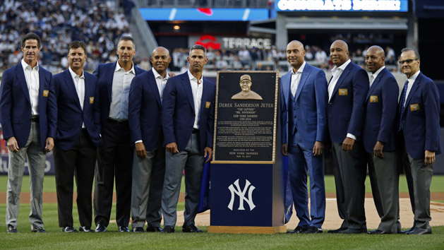 May 14, 2017; Bronx, NY, USA; Former New York Yankees shortstop Derek Jeter poses for a photo with his monument park plaque along with former teammates during a pre-game ceremony to also retire his jersey number before the game against the Houston Astros at Yankee Stadium. Photo Credit: Adam Hunger-USA TODAY Sports