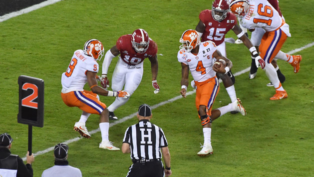 Jan 9, 2017; Tampa, FL, USA; Clemson Tigers quarterback Deshaun Watson (4) scores a touchdown against the Alabama Crimson Tide in the second quarter in the 2017 College Football Playoff National Championship Game at Raymond James Stadium. Photo Credit: Jasen Vinlove-USA TODAY Sports