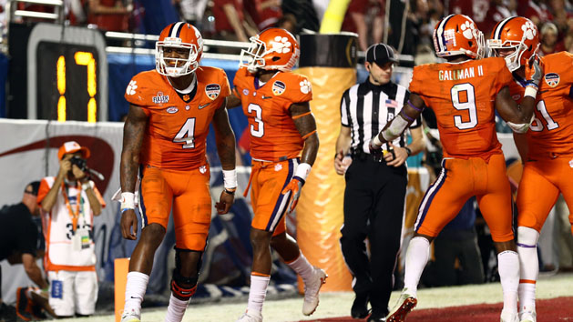 Dec 31, 2015; Miami Gardens, FL, USA; Clemson Tigers running back Wayne Gallman (9) and quarterback Deshaun Watson (4) celebrate after scoring against the Oklahoma Sooners during the third quarter of the 2015 CFP semifinal at the Orange Bowl at Sun Life Stadium. Mandatory Credit: Steve Mitchell-USA TODAY Sports
