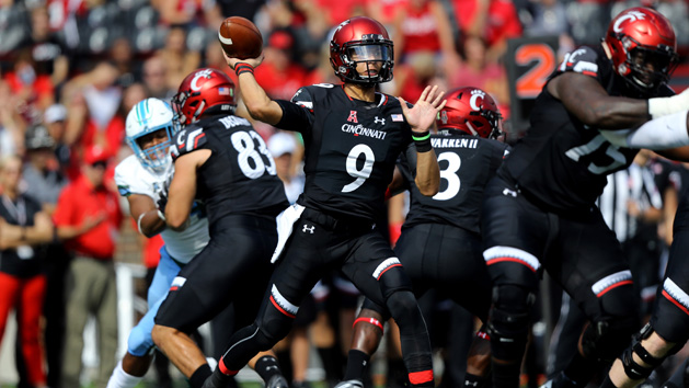 Oct 6, 2018; Cincinnati, OH, USA; Cincinnati Bearcats quarterback Desmond Ridder (9) throws a pass against the Tulane Green Wave in the first half at Nippert Stadium. Photo Credit: Aaron Doster-USA TODAY Sports
