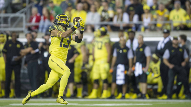 Sep 10, 2016; Eugene, OR, USA; Oregon Ducks wide receiver Devon Allen (13) catches the ball against the Virginia Cavaliers in the third quarter at Autzen Stadium. Photo Credit: Cole Elsasser-USA TODAY Sports