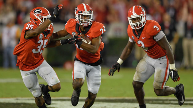 Sep 23, 2017; Athens, GA, USA; Georgia Bulldogs safety Dominick Sanders (24) runs with the ball after an interception against the Mississippi State Bulldogs during the second half at Sanford Stadium. Photo Credit: Dale Zanine-USA TODAY Sports