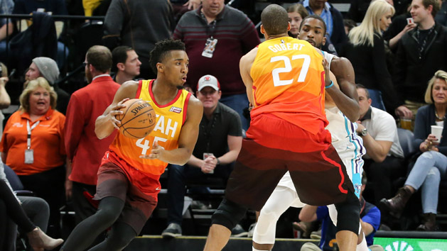 Feb 9, 2018; Salt Lake City, UT, USA; Utah Jazz guard Donovan Mitchell (45) uses to Utah Jazz center Rudy Gobert (27) to block Charlotte Hornets forward Michael Kidd-Gilchrist (14) from guarding him during the first quarter at Vivint Smart Home Arena. Photo Credit: Chris Nicoll-USA TODAY Sports