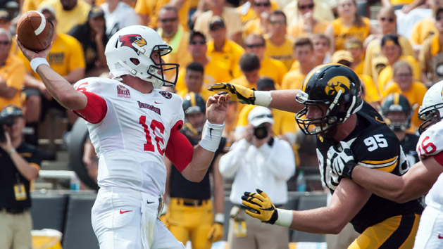 Drew Ott (95) pursues Illinois State Redbirds quarterback Jake Kolbe (16) during the fourth quarter at Kinnick Stadium. Iowa won 31-14. Photo Credit: Jeffrey Becker-USA TODAY Sports