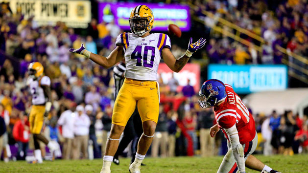 Oct 22, 2016; Baton Rouge, LA, USA; LSU Tigers linebacker Duke Riley (40) celebrates as Mississippi Rebels quarterback Chad Kelly (10) looks on following a defensive stop during the second half of a game at Tiger Stadium. LSU defeated Mississippi 38-21. Photo Credit: Derick E. Hingle-USA TODAY Sports