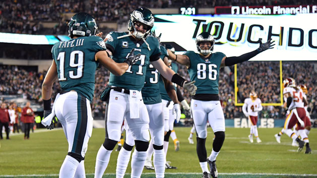 Dec 3, 2018; Philadelphia, PA, USA; Philadelphia Eagles wide receiver Golden Tate (19) celebrates his 6-yard touchdown catch with quarterback Carson Wentz (11) against the Washington Redskins during the first quarter at Lincoln Financial Field. Photo Credit: Eric Hartline-USA TODAY Sports