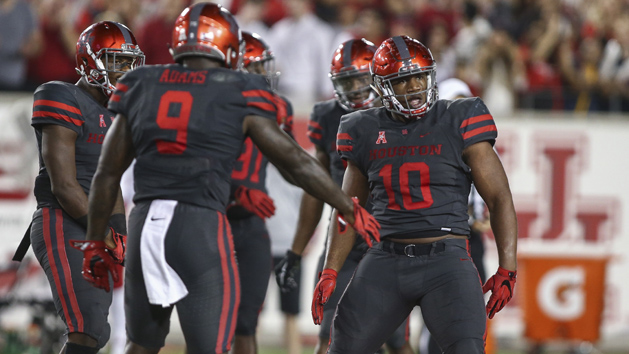 Nov 17, 2016; Houston, TX, USA; Houston Cougars defensive tackle Ed Oliver (10) celebrates after a play during the third quarter against the Louisville Cardinals at TDECU Stadium. Photo Credit: Troy Taormina-USA TODAY Sports
