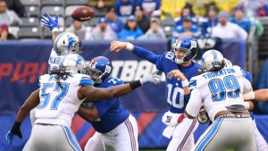 Manning tosses two TDs as Giants beat Lions 17-6