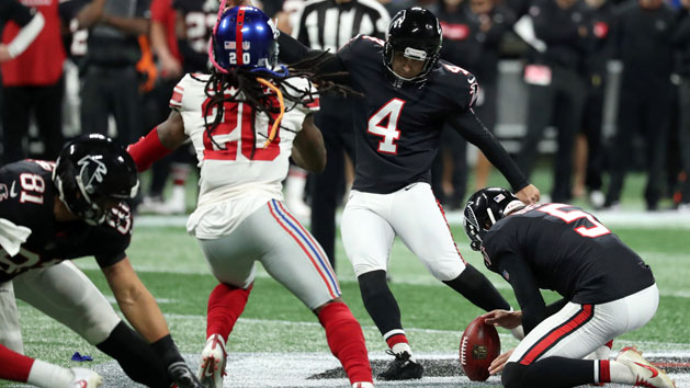 Oct 22, 2018; Atlanta, GA, USA; Atlanta Falcons kicker Giorgio Tavecchio (4) kicks a field goal as punter Matt Bosher (5) holds as New York Giants cornerback Janoris Jenkins (20) watches in the fourth quarter at Mercedes-Benz Stadium. Photo Credit: Jason Getz-USA TODAY Sports
