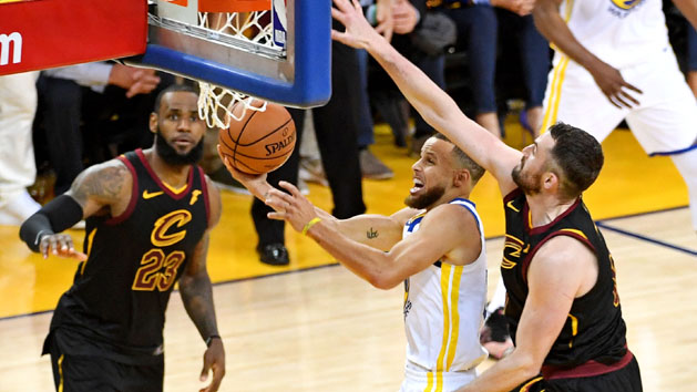 May 31, 2018; Oakland, CA, USA; Golden State Warriors guard Stephen Curry (30) shoots the ball against Cleveland Cavaliers center Kevin Love (0) during the fourth quarter in game one of the 2018 NBA Finals at Oracle Arena. Photo Credit: Kyle Terada-USA TODAY Sports