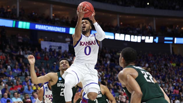 Mar 19, 2017; Tulsa, OK, USA; Kansas Jayhawks guard Frank Mason III (0) goes up for a shot as Michigan State Spartans guard Miles Bridges (22) guards during the first half in the second round of the 2017 NCAA Tournament at BOK Center. Photo Credit: Brett Rojo-USA TODAY Sports