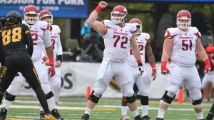 Arkansas C Ragnow may see time on defense