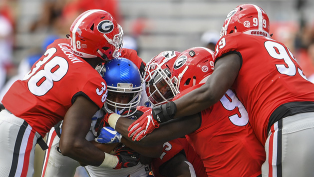Sep 15, 2018; Athens, GA, USA; Middle Tennessee Blue Raiders running back Landon Board (17) is gang tackled by Georgia Bulldogs defenders including linebacker Azeez Ojulari (38) and defensive lineman Devonte Wyatt (95) during the second half at Sanford Stadium. Photo Credit: Dale Zanine-USA TODAY Sports