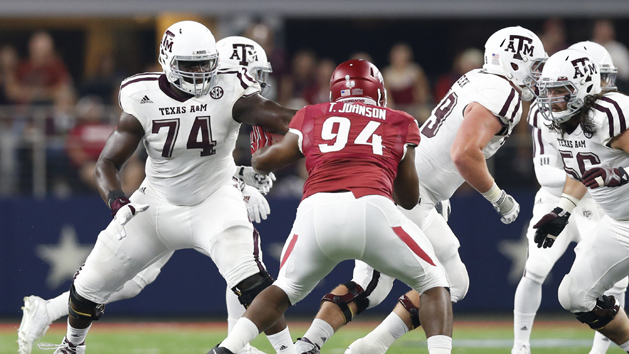 Sep 26, 2015; Arlington, TX, USA; Texas A&M Aggies tackle Germain Ifedi (74) in action against the Arkansas Razorbacks at AT&T Stadium. Mandatory Credit: Matthew Emmons-USA TODAY Sports