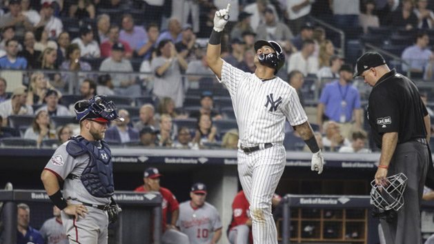 Jun 13, 2018; Bronx, NY, USA; New York Yankees second baseman Gleyber Torres (25) celebrates at home plate after hitting a home run in the fifth inning against the Washington Nationals at Yankee Stadium. Photo Credit: Wendell Cruz-USA TODAY Sports