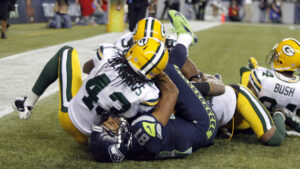 Officials aid Seattle’s wild come-back win over Pack