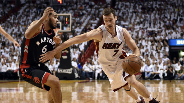 May 9, 2016; Miami, FL, USA; Miami Heat guard Goran Dragic (7) drives to the basket as Toronto Raptors guard Cory Joseph (6) defends during the fourth quarter in game four of the second round of the NBA Playoffs at American Airlines Arena. The Heat won in overtime 94-87. Mandatory Credit: Steve Mitchell-USA TODAY Sports