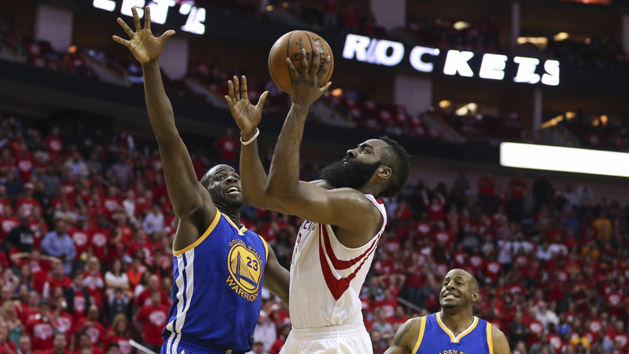 Apr 21, 2016; Houston, TX, USA; Houston Rockets guard James Harden (13) shoots the ball as Golden State Warriors forward Draymond Green (23) defends during the fourth quarter in game three of the first round of the NBA Playoffs at Toyota Center. The Rockets won 97-96. Mandatory Credit: Troy Taormina-USA TODAY Sports