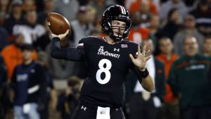 Moore keys Cincinnati upset of Miami in first start