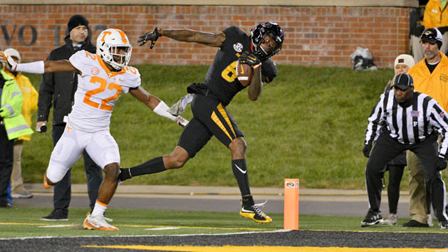Nov 11, 2017; Columbia, MO, USA; Missouri Tigers wide receiver J'Mon Moore (6) scores a touchdown as Tennessee Volunteers defensive back Micah Abernathy (22) attempts the tackle during the second half at Faurot Field. Photo Credit: Denny Medley-USA TODAY Sports