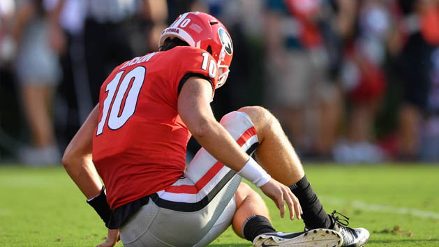 Sep 2, 2017; Athens, GA, USA; Georgia Bulldogs quarterback Jacob Eason (10) falls after being injured against the Appalachian State Mountaineers during the first quarter at Sanford Stadium. Photo Credit: Dale Zanine-USA TODAY Sports