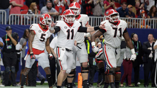 Dec 2, 2017; Atlanta, GA, USA; Georgia Bulldogs quarterback Jake Fromm (11) celebrates after throwing a pass for a successful two point conversion to wide receiver Terry Godwin (5) against the Auburn Tigers during the fourth quarter of the SEC Championship game at Mercedes-Benz Stadium. Photo Credit: Marvin Gentry-USA TODAY Sports