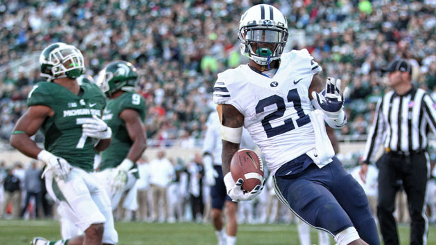 Oct 8, 2016; East Lansing, MI, USA; Brigham Young Cougars running back Jamaal Williams (21) runs the ball for a touchdown during the second half of a game against the Michigan State Spartans at Spartan Stadium. Photo Credit: Mike Carter-USA TODAY Sports
