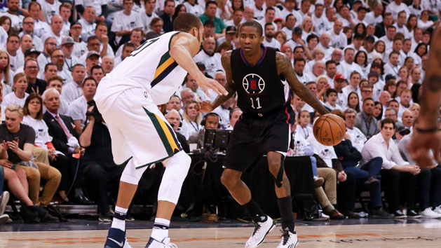 Apr 28, 2017; Salt Lake City, UT, USA; LA Clippers guard Jamal Crawford (11) dribbles the ball while being guarded by Utah Jazz center Rudy Gobert (27) during the second quarter in game six of the first round of the 2017 NBA Playoffs at Vivint Smart Home Arena. Photo Credit: Chris Nicoll-USA TODAY Sports