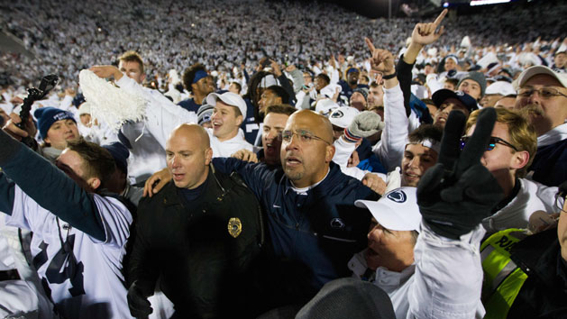 Oct 22, 2016; University Park, PA, USA; Penn State Nittany Lions head coach James Franklin (center) is surrounded by fans following the conclusion of the game against the Ohio State Buckeyes at Beaver Stadium. Penn State defeated Ohio State 24-21. Photo Credit: Matthew O'Haren-USA TODAY Sports