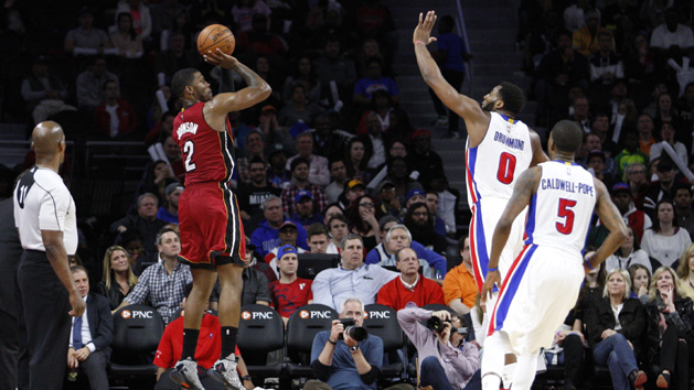 Apr 12, 2016; Auburn Hills, MI, USA; Miami Heat forward Joe Johnson (2) takes a shot over Detroit Pistons center Andre Drummond (0) during the fourth quarter at The Palace of Auburn Hills. Heat win 99-93. Mandatory Credit: Raj Mehta-USA TODAY Sports