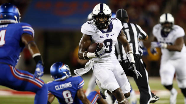 Sep 23, 2016; Dallas, TX, USA; TCU Horned Frogs wide receiver John Diarse (9) runs the ball against Southern Methodist Mustangs safety Mikial Onu (4) in the third quarter at Gerald J. Ford Stadium. Photo Credit: Tim Heitman-USA TODAY Sports