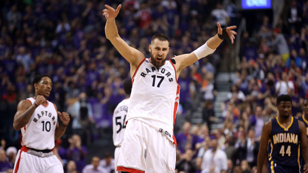 Apr 18, 2016; Toronto, Ontario, CAN; Toronto Raptors center Jonas Valanciunas (17) celebrates after making a basket against the Indiana Pacers in game two of the first round of the 2016 NBA Playoffs at Air Canada Centre. Mandatory Credit: Tom Szczerbowski-USA TODAY Sports