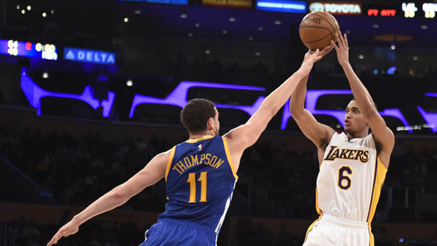 Mar 6, 2016; Los Angeles, CA, USA; Los Angeles Lakers guard Jordan Clarkson (6) shoots over Golden State Warriors guard Klay Thompson (11) during the NBA game at the Staples Center. Mandatory Credit: Richard Mackson-USA TODAY Sports