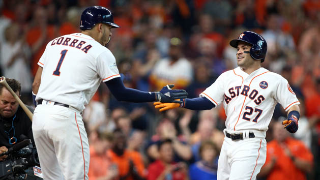 Oct 5, 2017; Houston, TX, USA; Houston Astros second baseman Jose Altuve (27) celebrates with shortstop Carlos Correa (1) after hitting a home run during the seventh inning against the Boston Red Sox in game one of the 2017 ALDS playoff baseball series at Minute Maid Park. Photo Credit: Troy Taormina-USA TODAY Sports