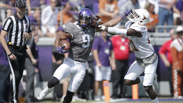 Oct 3, 2015; Fort Worth, TX, USA; Texas Christian University Horned Frogs wide receiver Josh Doctson (9) stiff arms University of Texas Longhorns cornerback Duke Thomas (21) in the second quarter at Amon G. Carter Stadium. Mandatory Credit: Erich Schlegel-USA TODAY Sports