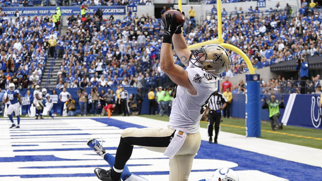 Oct 25, 2015; Indianapolis, IN, USA; New Orleans Saints tight end Josh Hill (89) catches a pass in the end zone but touchdown was nullified after committing offensive pass interference against Indianapolis Colts safety Colt Anderson (32) at Lucas Oil Stadium. Mandatory Credit: Brian Spurlock-USA TODAY Sports