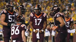 Jackson lifts No. 21 Va. Tech past No. 22 WVU