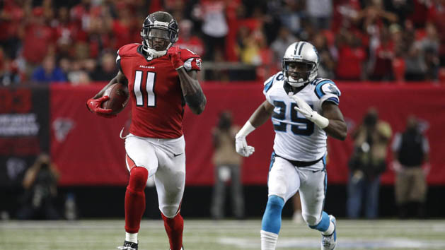Oct 2, 2016; Atlanta, GA, USA; Atlanta Falcons wide receiver Julio Jones (11) runs for a touchdown against Carolina Panthers cornerback Bene' Benwikere (25) in the fourth quarter of their game at the Georgia Dome. The Falcons won 48-33. Photo Credit: Jason Getz-USA TODAY Sports