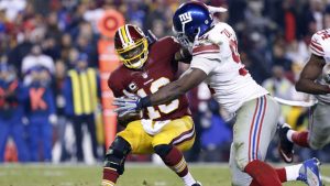 Tuck’s four sacks help Giants beat Redskins