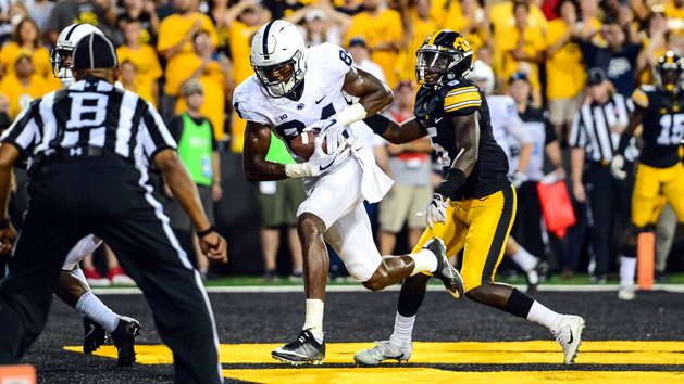 Sep 23, 2017; Iowa City, IA, USA; Penn State Nittany Lions wide receiver Juwan Johnson (84) catches the game winning touchdown from quarterback Trace McSorley (not pictured) as Iowa Hawkeyes defensive back Manny Rugamba (5) defends during the fourth quarter at Kinnick Stadium. Penn State won 21-19. Photo Credit: Jeffrey Becker-USA TODAY Sports