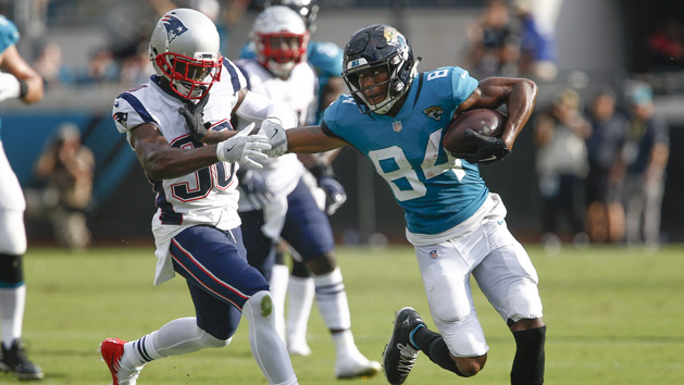 Sep 16, 2018; Jacksonville, FL, USA; Jacksonville Jaguars wide receiver Keelan Cole (84) runs out of bounds defended by New England Patriots cornerback Jason McCourty (30) during the second quarter at TIAA Bank Field. Photo Credit: Reinhold Matay-USA TODAY Sports